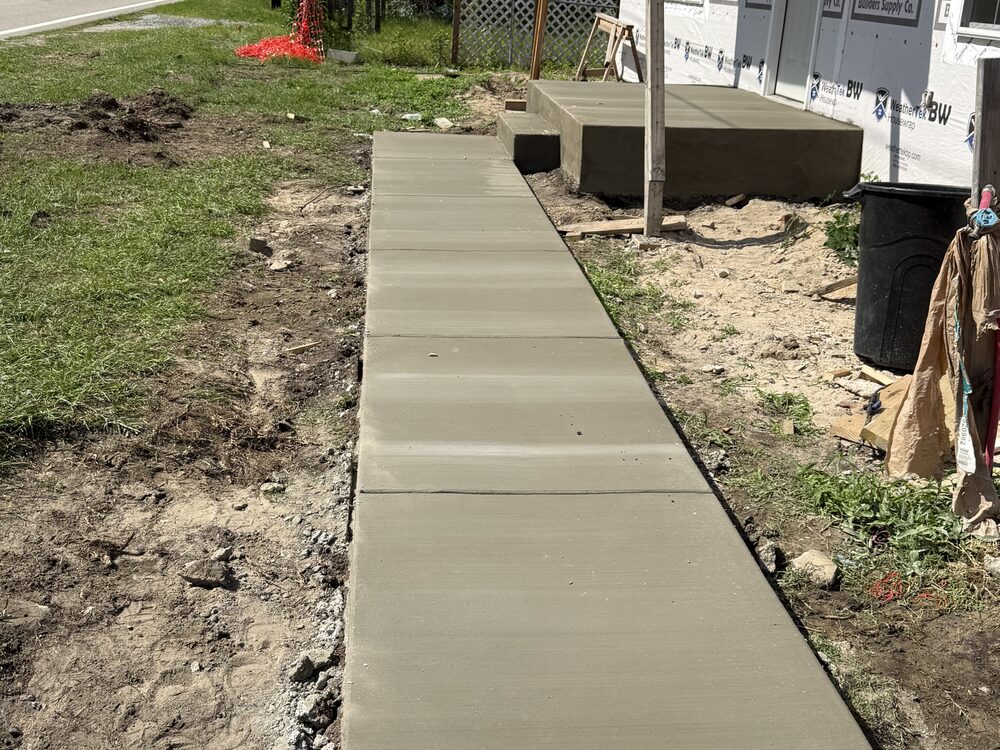 Completed FIG concrete flatwork — walkway