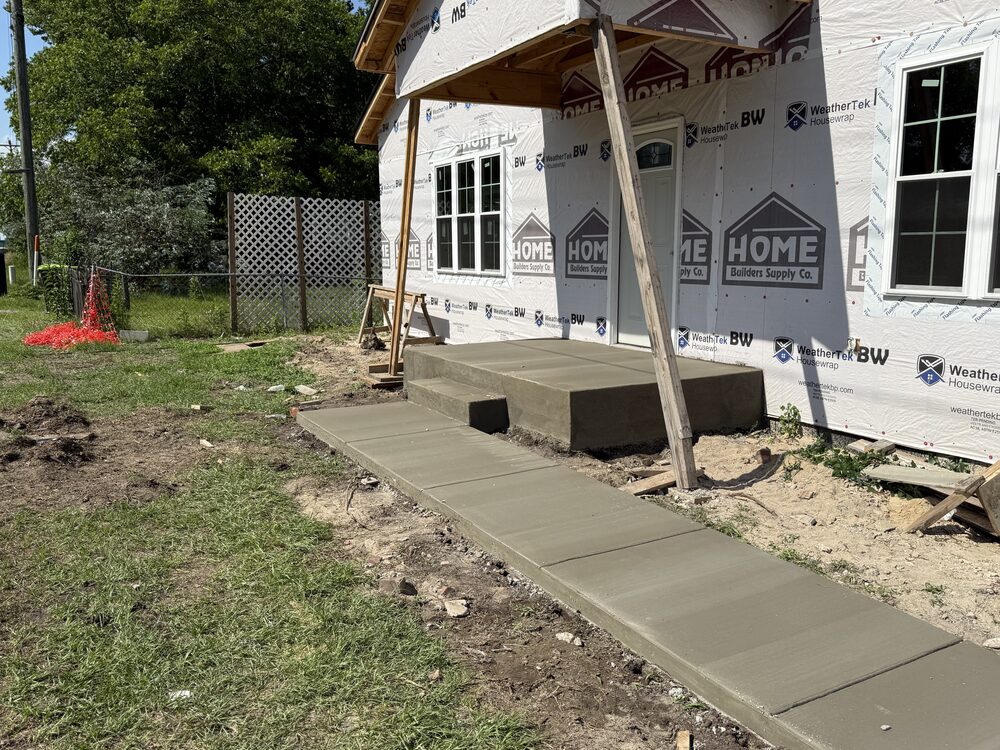 Completed FIG concrete flatwork — walkway