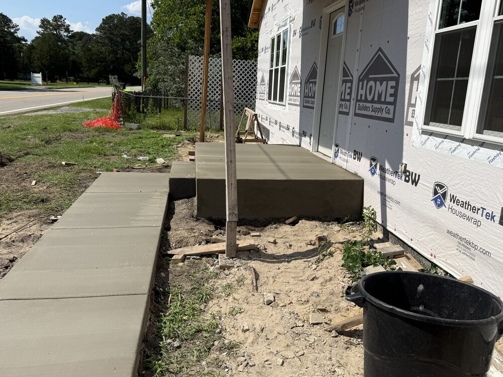 Completed FIG concrete flatwork — walkway