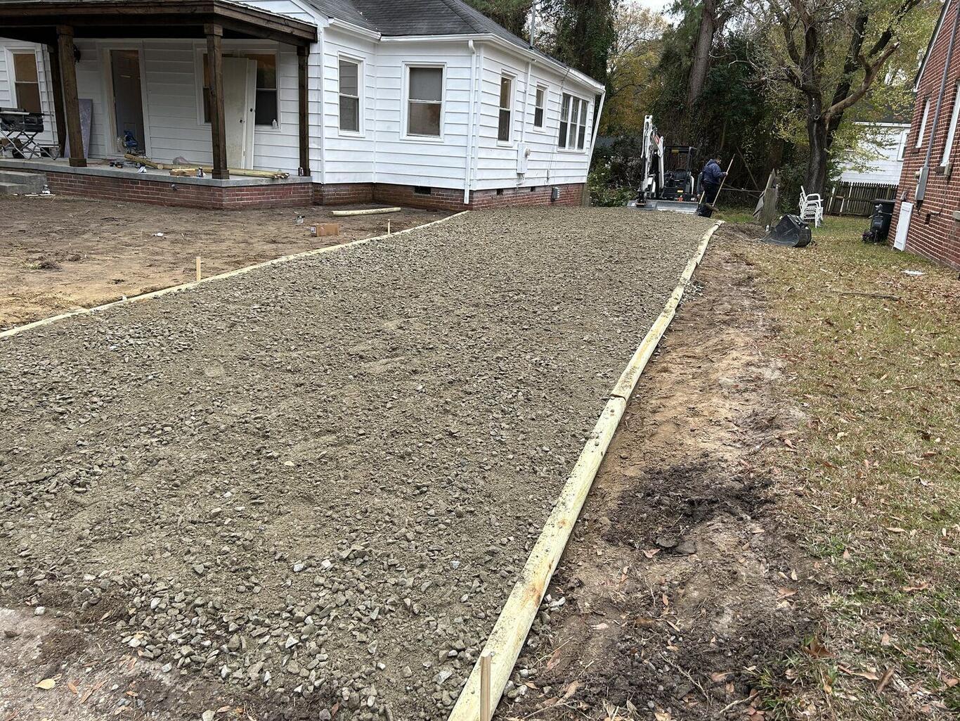 FIG exterior sitework — new gravel driveway