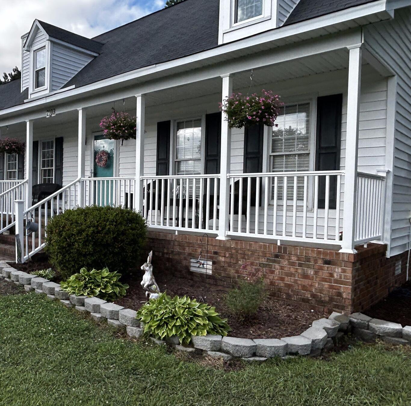 Completed FIG exterior — front of home with full porch