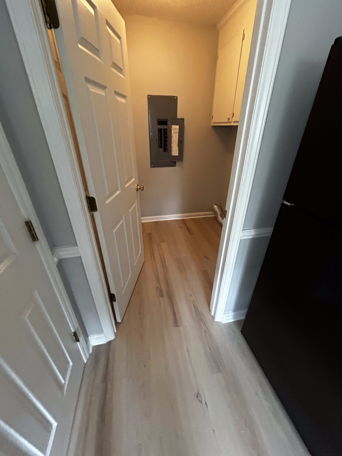 Completed FIG LVP wood-look flooring — hallway