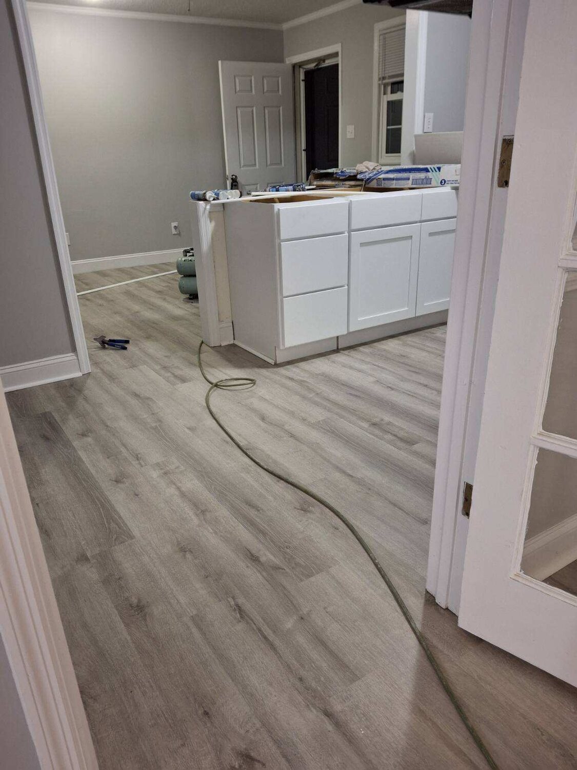 Completed FIG LVP wood-look flooring — kitchen