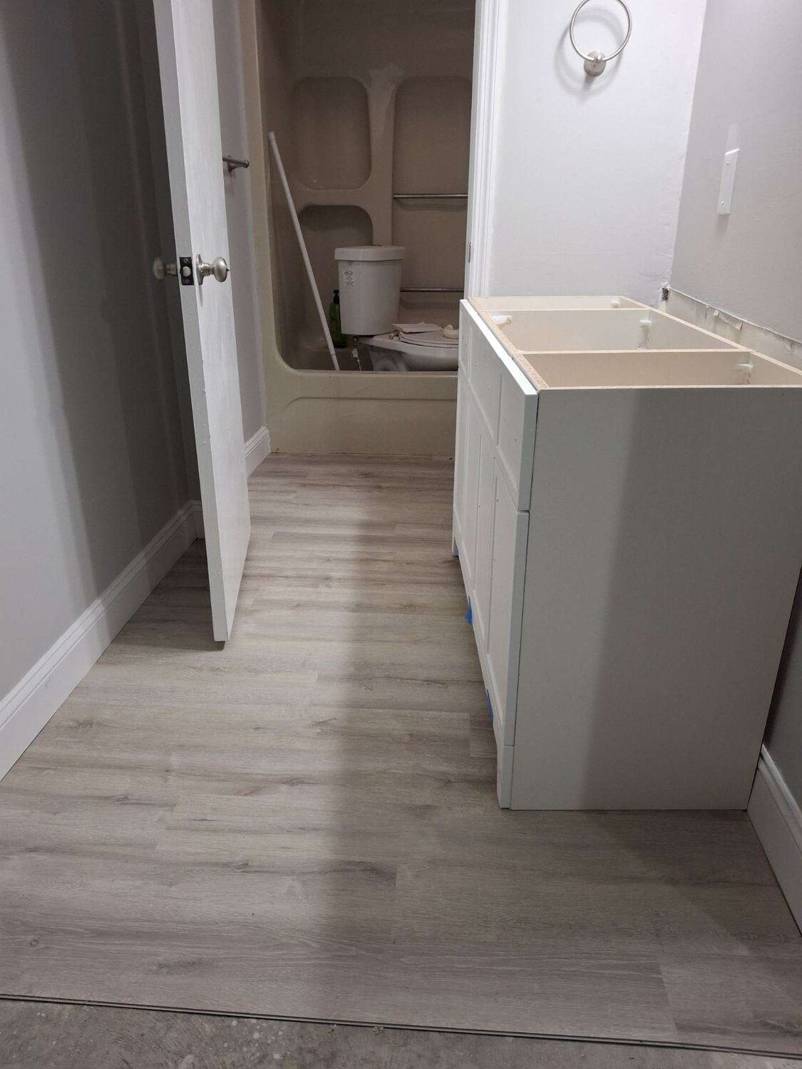 Completed FIG LVP wood-look flooring — hallway