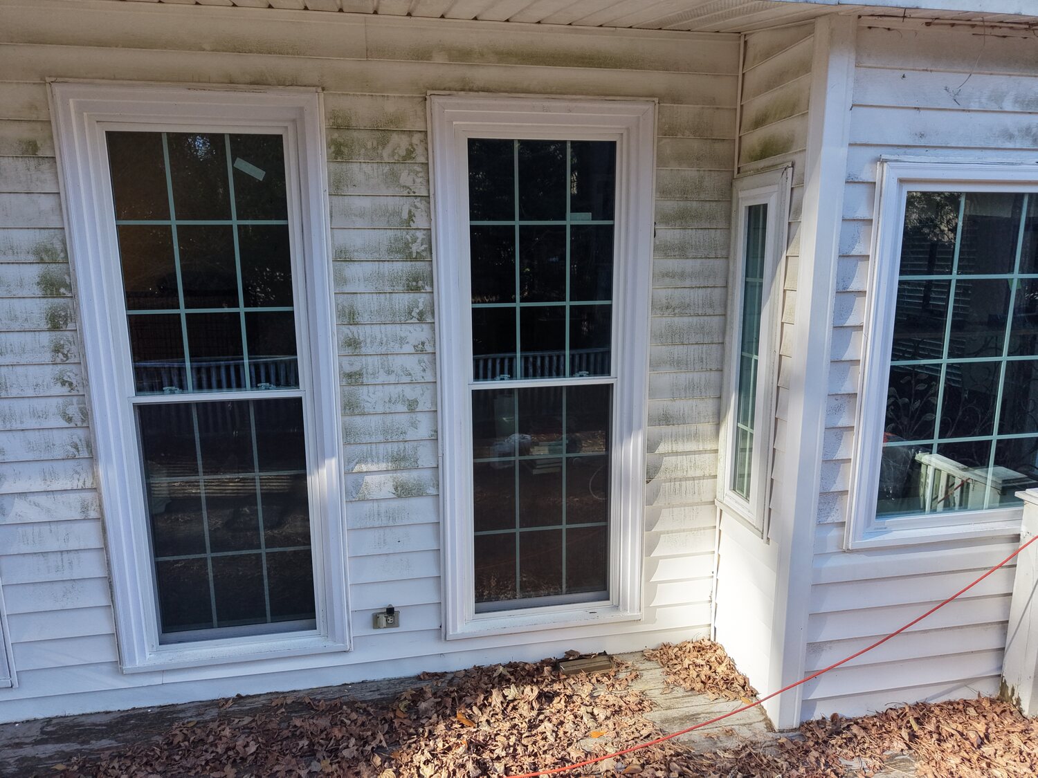 Completed FIG windows — 203 Club Pines, new windows with white exterior trim